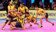 Rakesh Kumar successfully tackles Patna Pirates' Monu Goyat.